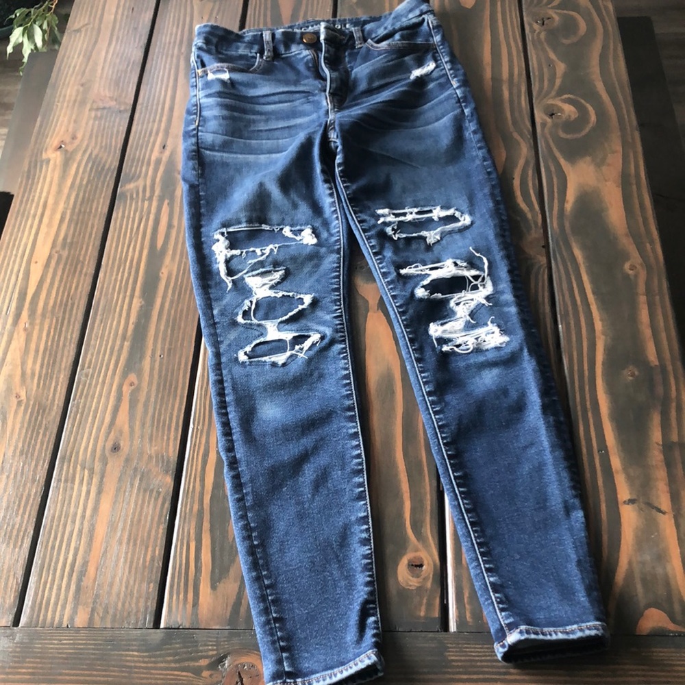 American eagle next level stretch frayed jeans